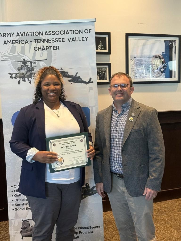 Dierdra Grant receiving award