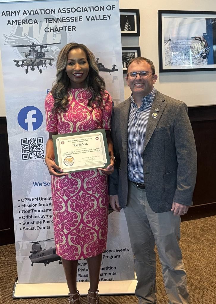 Raven Nall receiving award