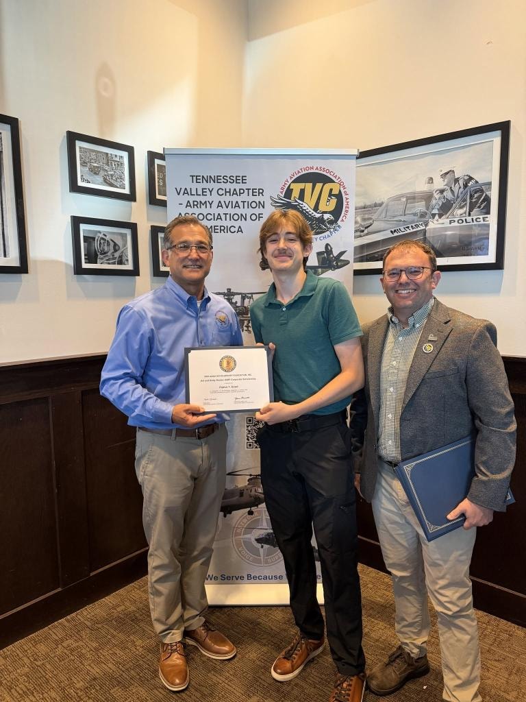 Logan Moore receives the LTC Steven D. Moore Memorial Scholarship